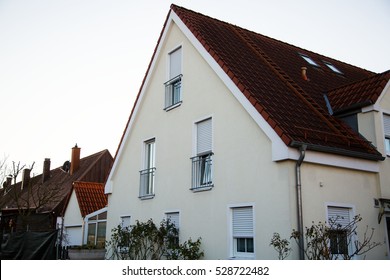 Single Family House In Munich, Blue Sky, White Facade