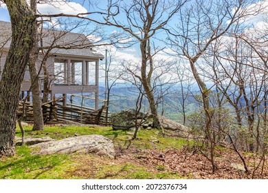 Single Family Mountain Vacation Rental House Wooden Deck On Stilts With Landscape View Overlook In Spring Springtime At Wintergreen Ski Resort Town City Of Nelson County, Virginia