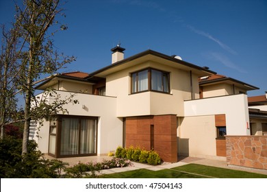 Single Family Yellow House Over Blue Sky