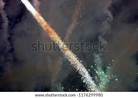 Single Firework Line in front of Smoke Screen