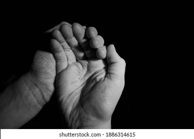 Single Grain Of Rice In The Open Hands Of A Child