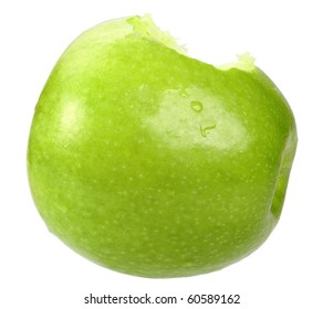 Single a green apple with bite. Isolated on white background. Close-up. Studio photography.