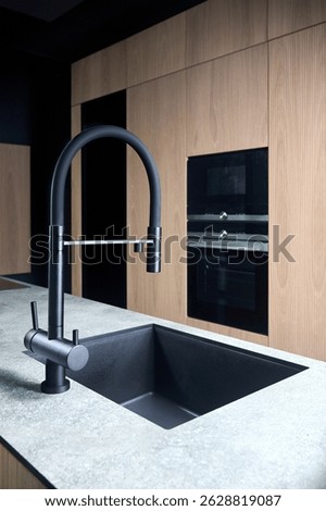 Single handle water filter kitchen faucet for reverse osmosis or water filtration system built in compact high pressure laminate HPL countertop. Kitchen undermount installation granite composite sink.