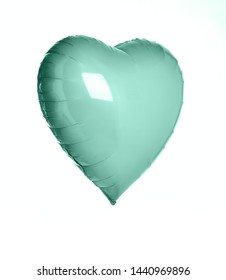 Single Light Green Pastel Color Big Metallic Heart Balloon Object For Birthday Isolated On White Background