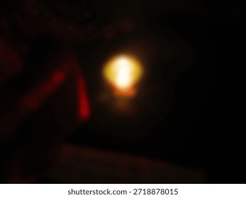 A single light source that is very bright and dim in the center.