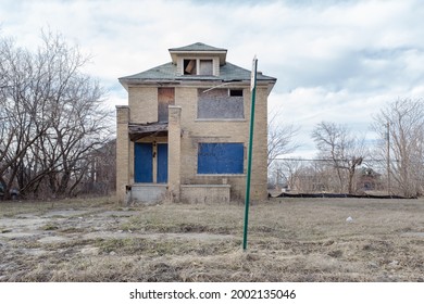 Single Lonely House Left Abandoned In Urban Detroit Neighborhood On Cloudy Day