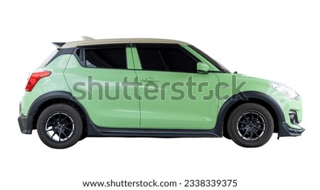 Single lovely small light green car or mini car is isolated on white background with clipping path.