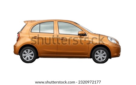 Single lovely small orange car is isolated on white background with clipping path.