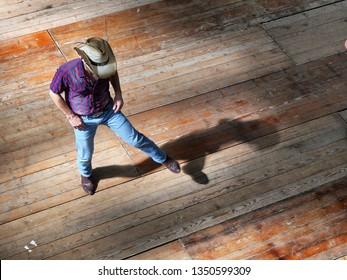 Single man traditional western folk music dancer view from above blur dynamism effect Turin Italy March 24 2019