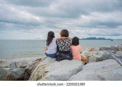 Single Mom And Child Sad At The Sea