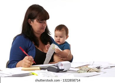 Single Mom Paying Bills With Baby In Hand. A Multitasking Mother Working With A Baby While Trying To Make Ends Meet. Isolated.