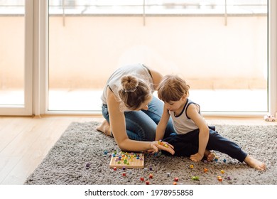 Single Mother Teaches Her 3 Year Old Son How To Count. Home Teaching Account. Development Of Math Skills.