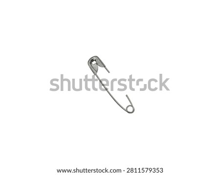 Single opened silver safety pin isolated on white background, close up shot of metallic fastener.