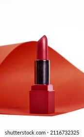 Single Opened Tube Of Satin Finish Red Lipstick, Studio Shot