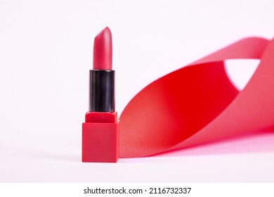 Single Opened Tube Of Satin Finish Red Lipstick, Studio Shot