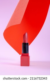 Single Opened Tube Of Satin Finish Red Lipstick, Studio Shot