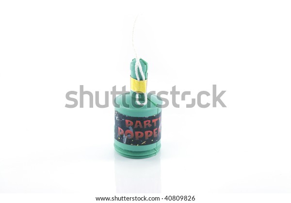 Single Party Popper On Reflective White Stock Photo Edit Now