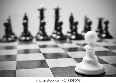 Single pawn against many enemies as a symbol of difficult unequal fight or struggle of minorities.