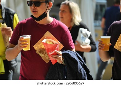 Single Person Walking In Crowded Downtown Eating Italian Street Food Turin Italy September 26 2022