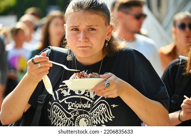 Single Person Walking In Crowded Downtown Eating Italian Street Food Turin Italy September 26 2022