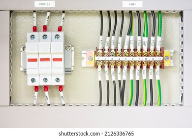 Single Phase Circuit Breaker Placed In The Home Fuse Box, Visible Electric Wires.