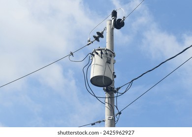 Single phase distribution transformer mounted on the utility pole