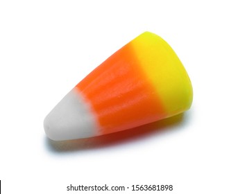 Single Piece Of Candy Corn Isolated On White Background.