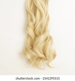 single piece string tied wavy light blonde synthetic hair extensions - Powered by Shutterstock