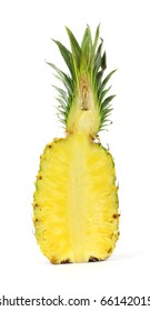 A single pineapple cut in half on a white background.