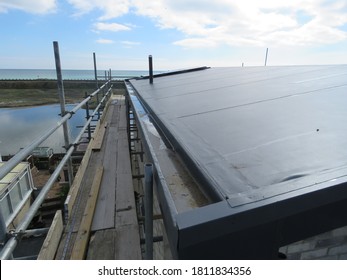 Single ply anthracite roof under construction 