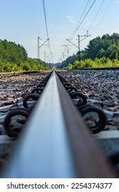 A single railway rail photo from the perspective of an ant - Shutterstock ID 2254374377