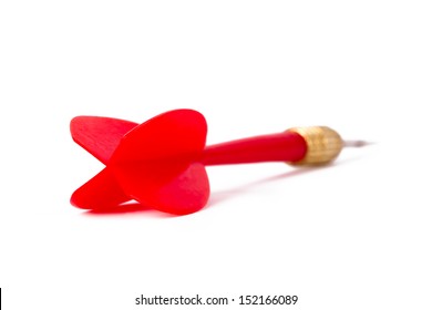 Single, red, plastic dart arrow, isolated on white background. - Shutterstock ID 152166089