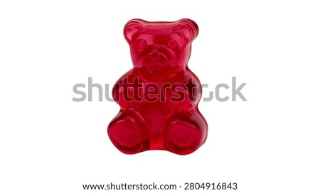 Single red translucent gummy bear candy shaped treat