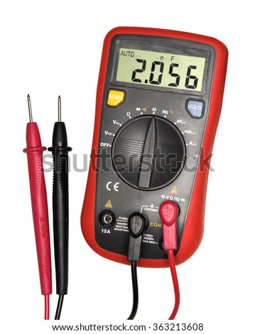 Single red-black digital multimeter. Isolated on white background. Close-up. Studio photography.