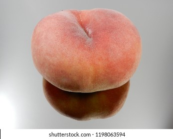 a single ripe peach
