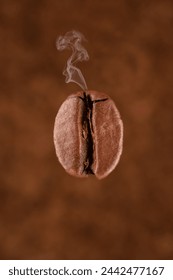 Single roasted coffee beans on brown background