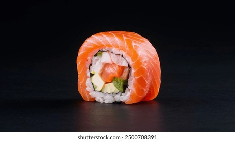 Single roll sushi salmon on dark background. Homemade sushi - Powered by Shutterstock