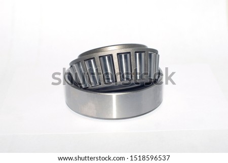 single row angular contact roller bearing on a white background