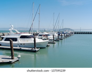 Single row of boats docked in San Francisco