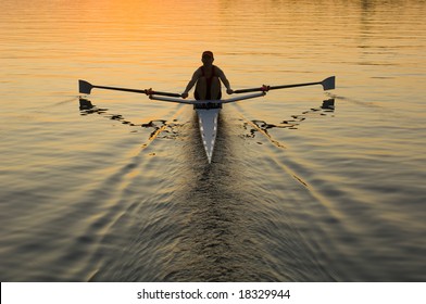 Single Rower At Sunrise