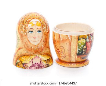 Single Russian nesting doll (also named as Matrioshka) isolated over white background. Wooden doll souvenir.