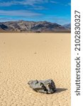 Single Sailing Stone Rests On The Southern End of The Racetrack Playa in Death Valley