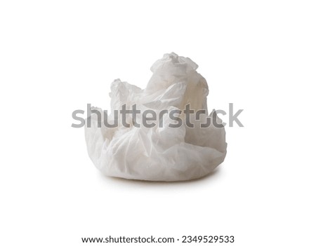 Single screwed or crumpled tissue paper or napkin in strange shape after use in toilet or restroom is isolated on white background with clipping path.