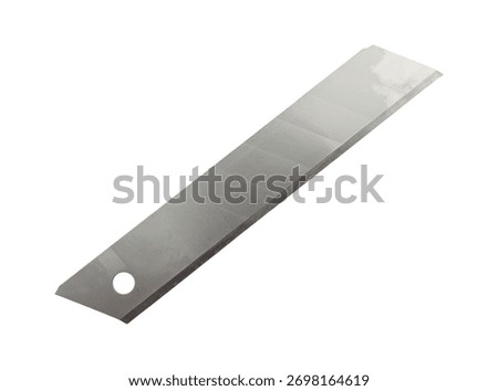 Single sharp segmented snap-off utility knife blade with a hole at one end on a white background.