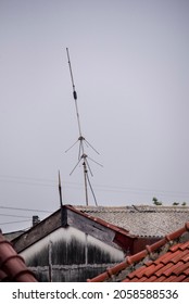 Single Side Band (SSB) High Frequency Radio Antenna On The Roof Of House