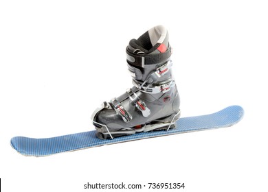 A Single Ski Boot And A Blade Isolated On A White Background