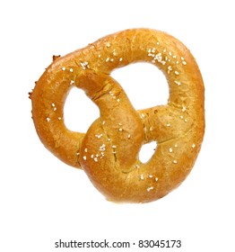 A Single Soft Pretzel With Salt On A White Background.