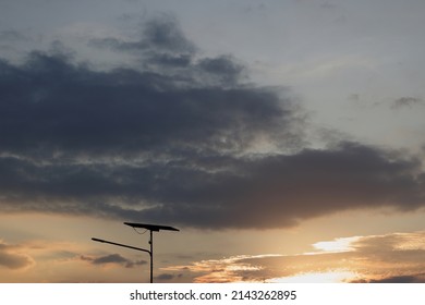 Single Solar Cell Panel Road Lighting Equipment At Golden Color Dramatic Tone Dusk Time Sky Under Renewable Energy Concept With Empty Copy Space For Text Quote Or Background Usage Work Or Project