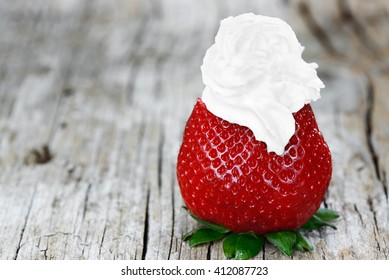 Single Strawberry With Whipped Cream