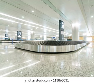 Single Suitcase Alone On Airport Carousel